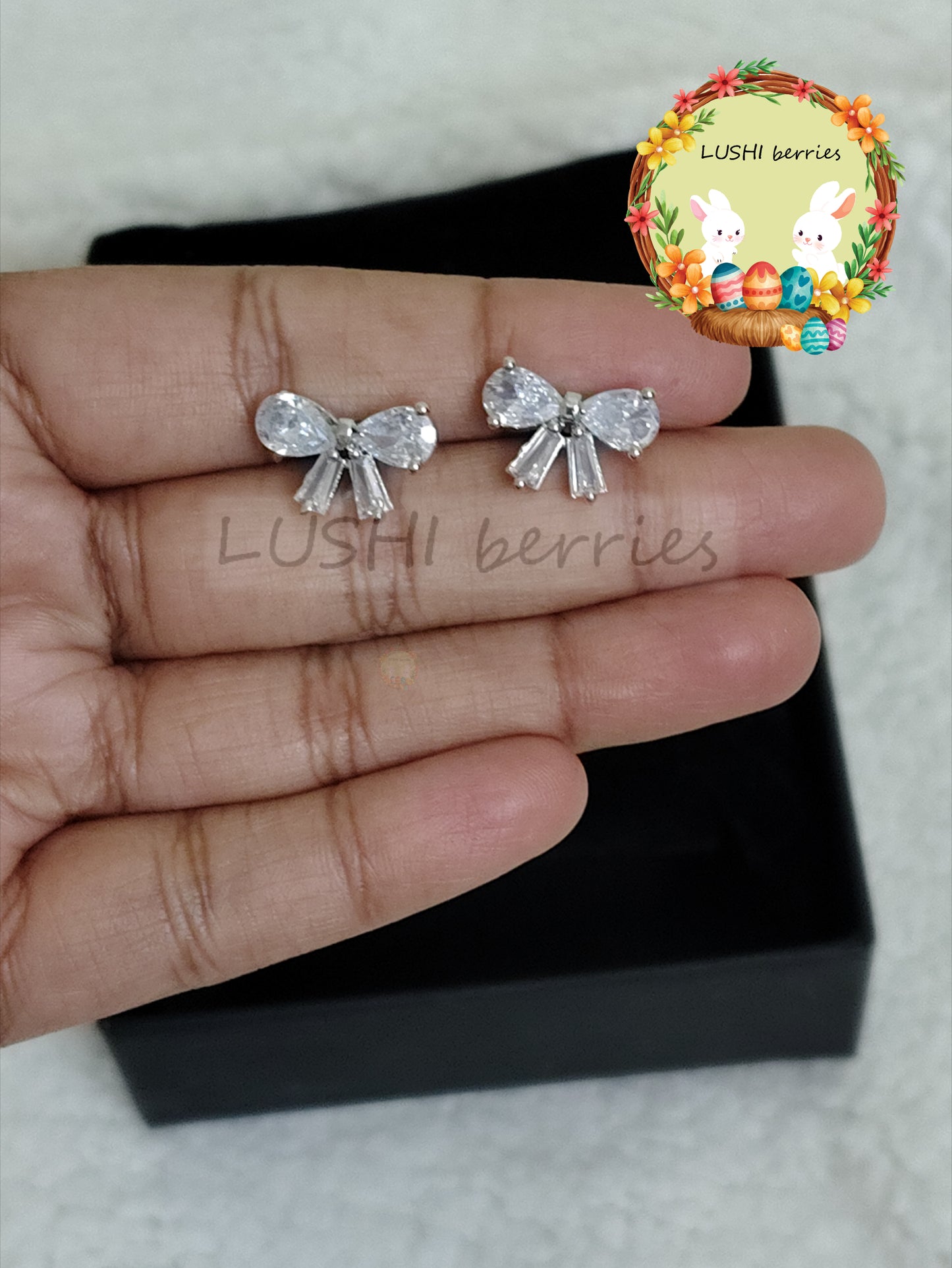 34_White Crystal Bow Stud