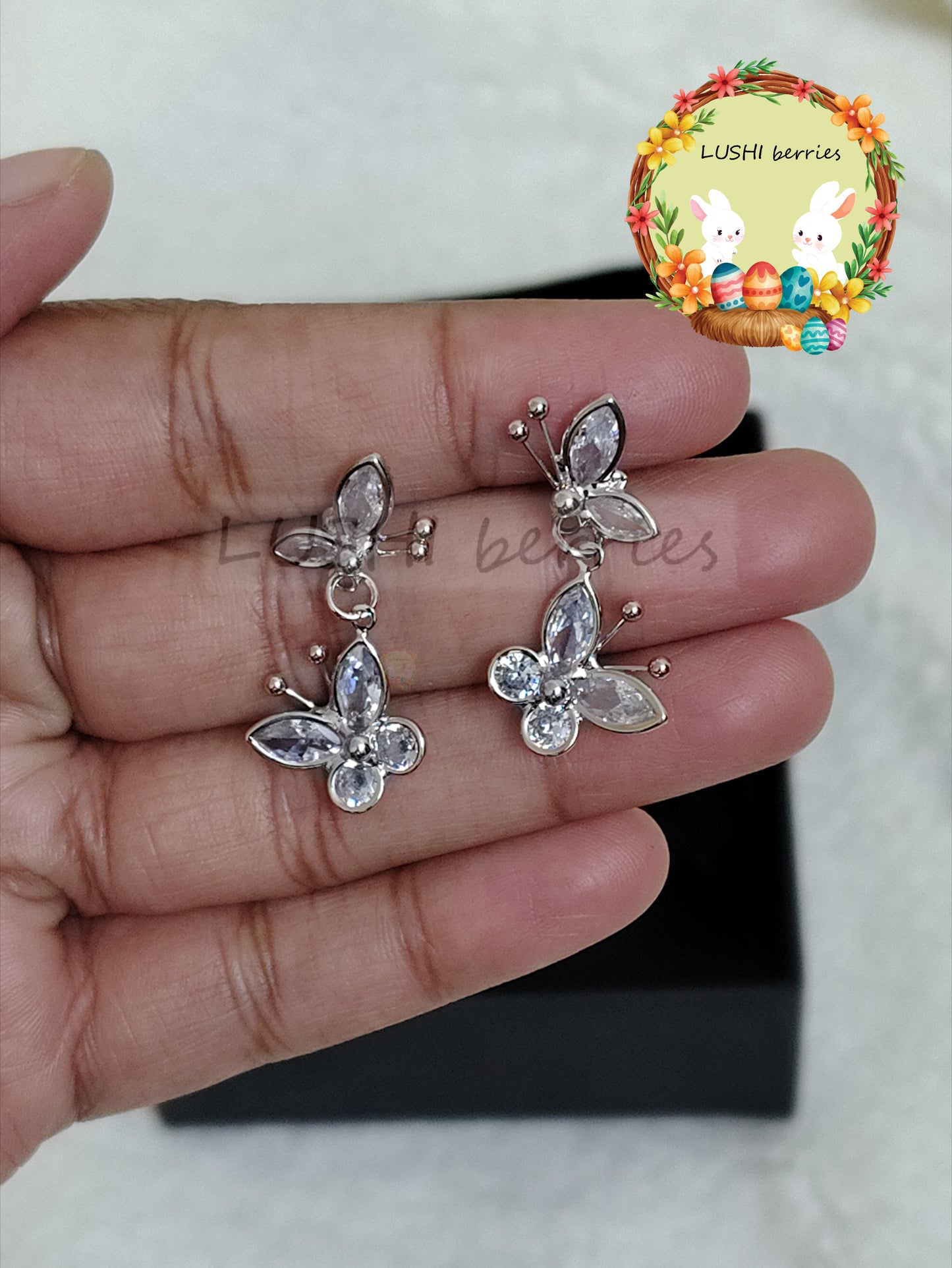 41_Butterfly White stone Hanging earrings