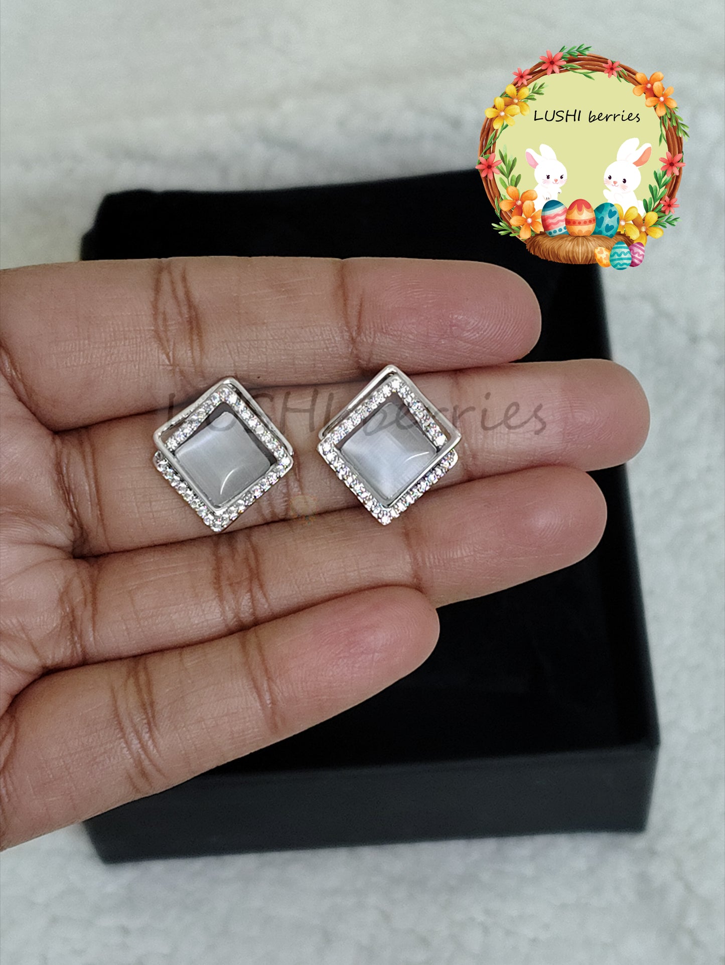 45_Grey and White stone Diamond shape Stud