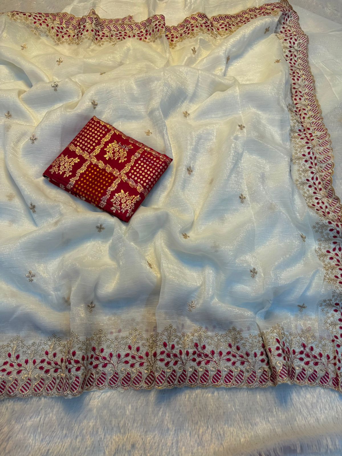 35_Crunchy chiffon saree with elegant scalap embroidery work